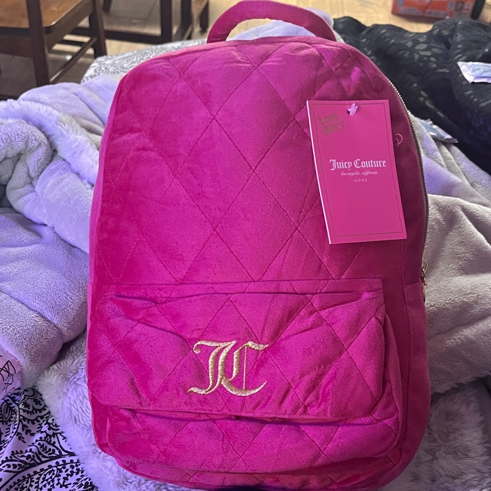 Juicy Couture Fuchsia Quilted Backpack pillow